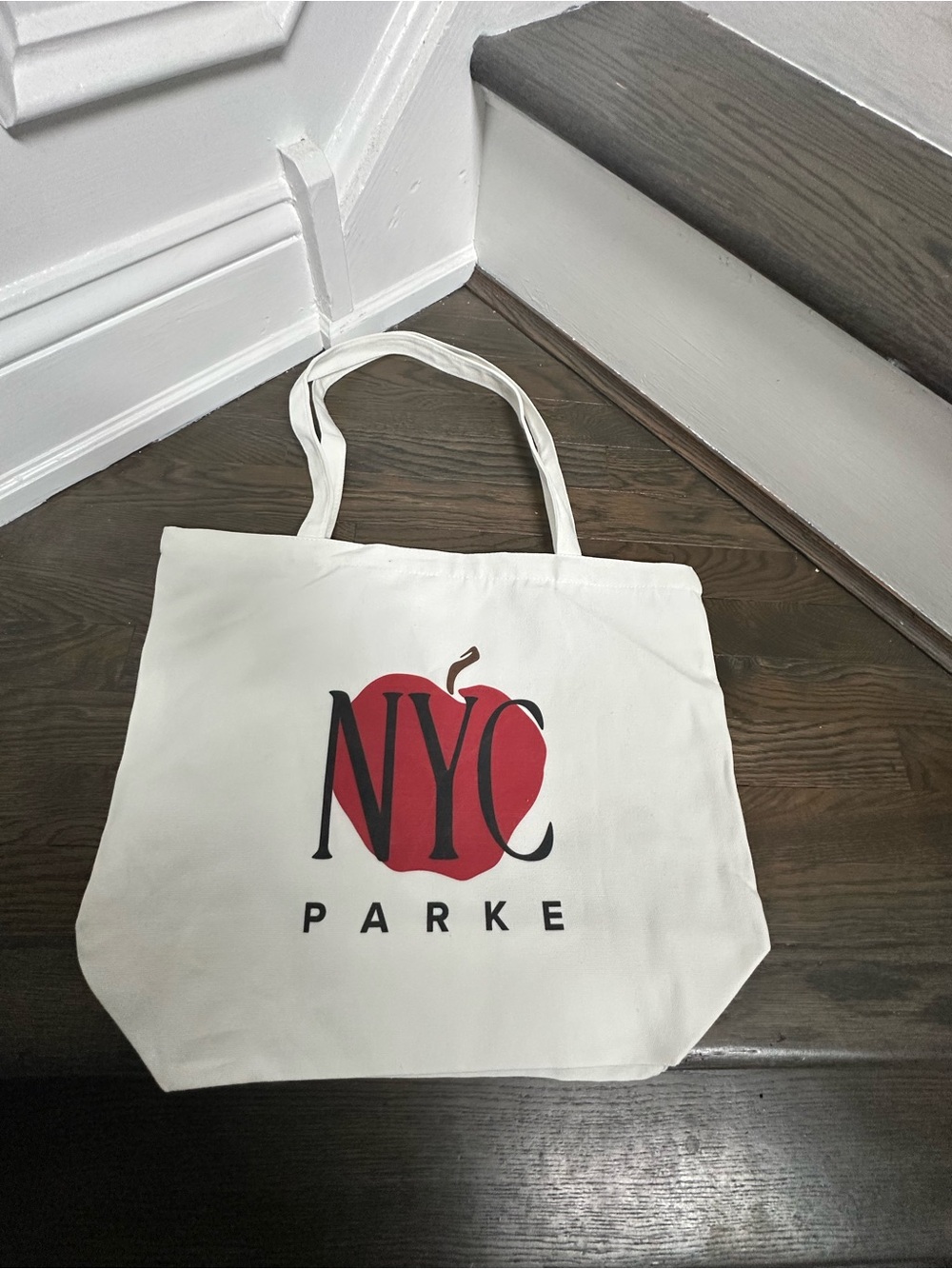 PARKÉ Cream Canvas Tote with Red NYC Apple Graphic